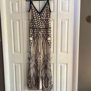 Costume white with black sequins